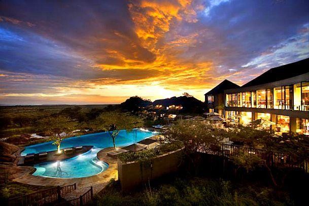 Infinity pool and savannah view at Four Seasons Safari Lodge Serengeti