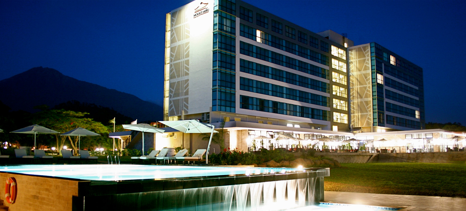 Gardens and Mount Meru backdrop at Mount Meru Hotel Arusha